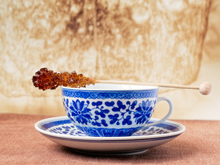 Cup of Tea and Brown Sugar Stirrer