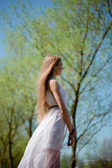 portrait of young woman in the forest