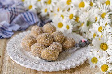 Truffles with lime white chocolate dried apricots and coconut   