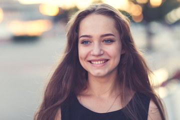 Portrait of a teenage girl outdoors in summer