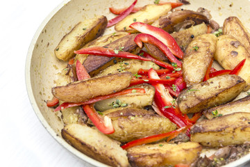 Roasted potatoe and sliced red peppers