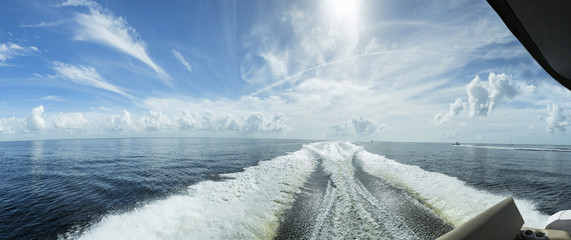 Wake behind boat underway