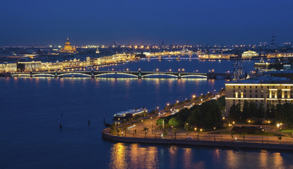 Evening view from the Neva river to St. Isaac's Cathedral and the Bridge