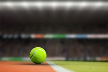 Composite image of tennis ball with a syringe