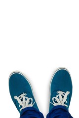 Man with canvas shoes on hardwood floor