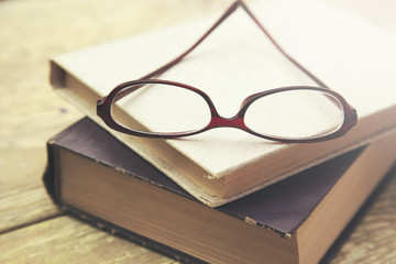 book,glasses and phone