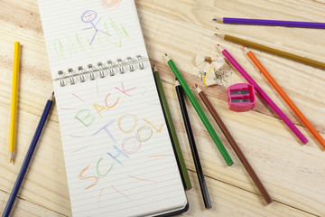 Notepad with a colourful back to school message on it