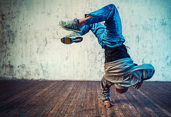 Man dancing on wall background