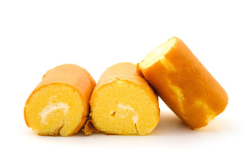 three pieces cake with cream in middle on white