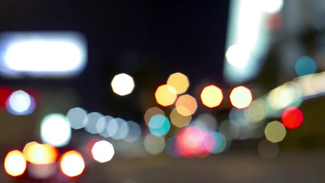 Driving through the rush hour traffic of a big city streets at night time lapse. Cars in the traffic jam in the main street of Las Vegas Strip, Nevada. Blurred effect