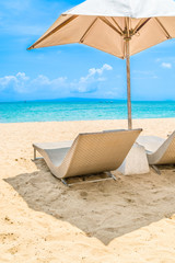Rattan weave daybed on a tropical beach.