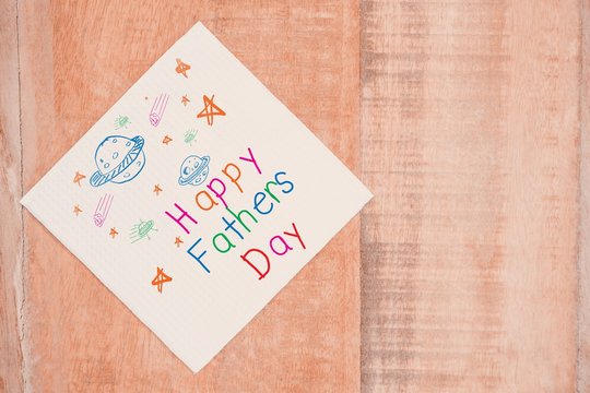 Composite image of word happy fathers day and space drawn 