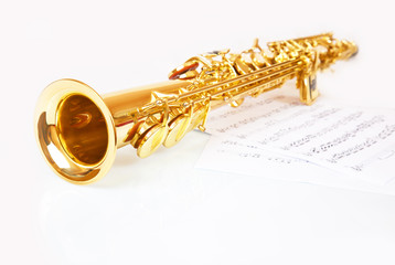Obraz premium Musical notes and saxophone