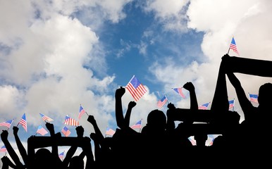Composite image of silhouettes of football supporters