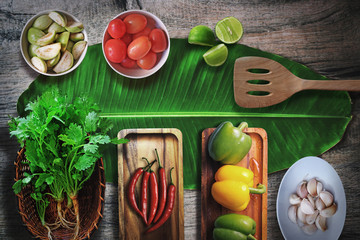 Vegetarian cooking creative concept home with fresh vegetables and healthy wooden top view a copy of the area, Thailand.