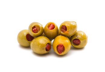 Green olives stuffed with red paprika