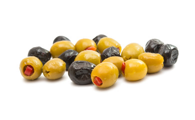 Green olives stuffed with red paprika