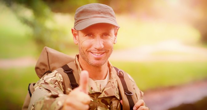 Portrait of happy army man with thumbs up