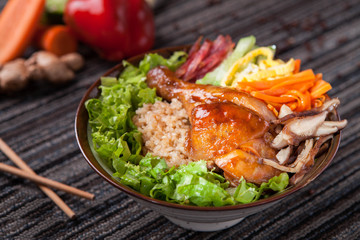 Fried rice with grilled chicken leg and mushroom in asia
