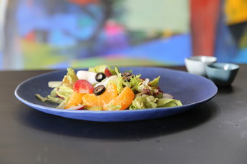 Vietnamese salad of orange, strawberry and vegetables