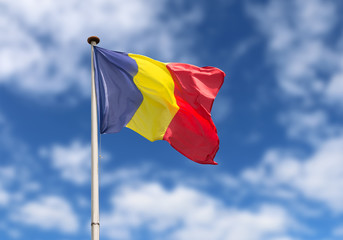 Wind blowing the Romanian flag on the mast