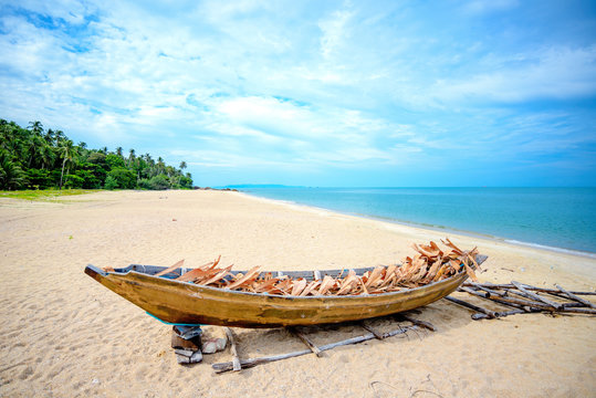 Longtail boat on tropical beach