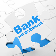 Money concept: Bank Investment on puzzle background