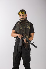 Beard soldier with ak-47 on white background