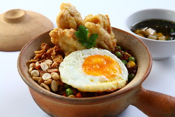 Bowl of fried shrimp, egg and bean