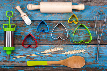 Accessories for baking. Cookie cutters, pastry syringe, whisk.