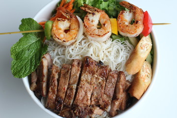 Bun thit nuong or grilled shrimp, beef, spring rolls vermicelli