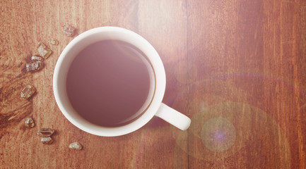 Morning coffee: black coffee and cane sugar in the sun