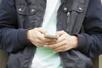 hands with mobile phone