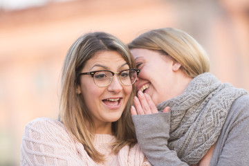 Two whispering girls