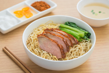 Roasted duck with noodles in bowl and soup © ritablue