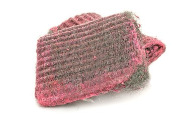 Wire wool scouring pads with soap on a white background