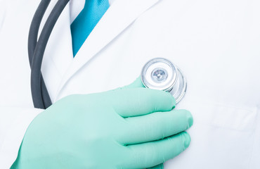 Close-up of hand with  stethoscope on heart