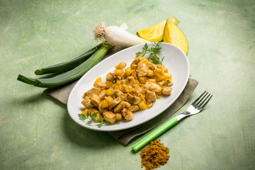 stew chicken with mango and curry