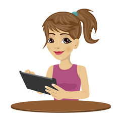 young teenager girl using tablet computer