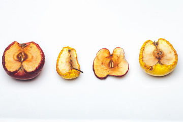 dried wrinkled apple isolated on white