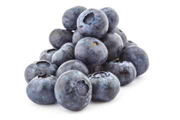 Pile of fresh ripe organic blueberries isolated on a white background