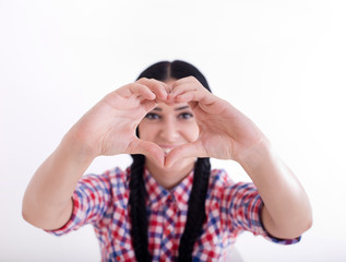 Girl forming heart shape