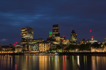 Fototapeta na wymiar London cityscape at dusk along river Thames