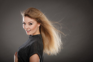 Naklejka premium Smiling joyful lady in trendy fashion look.