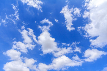 Fototapeta na wymiar Blue sky background with white clouds. The vast blue sky and clouds sky on sunny day. White fluffy clouds in the blue sky. beautiful clouds and blue sky.