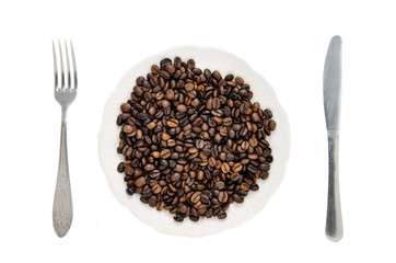 Coffee beans in a dish