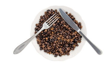Coffee beans in a dish