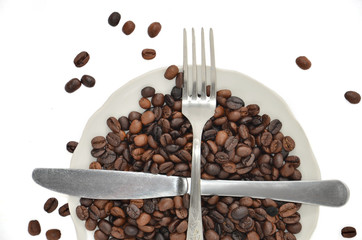 Coffee beans in a dish