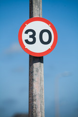 Speed restriction road sign