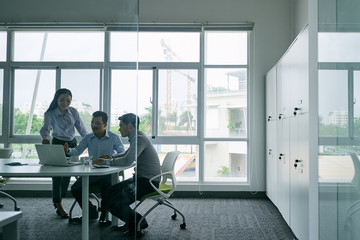 Vietnamese business team having meeting in office